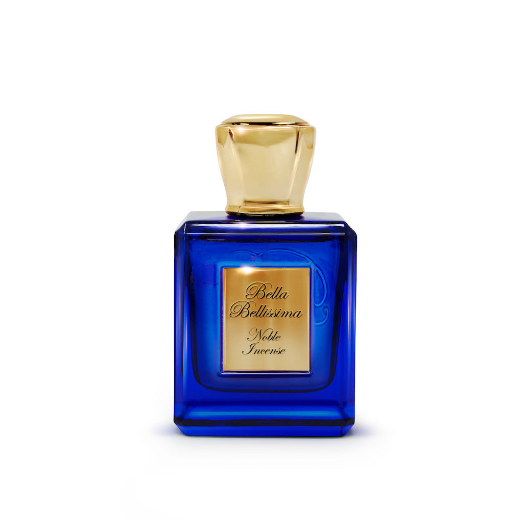 Noble Incense oud pure parfum by Bella Bellissima, presented in a royal blue glass colour bespoke bottle with a gold cap and engraved plaque