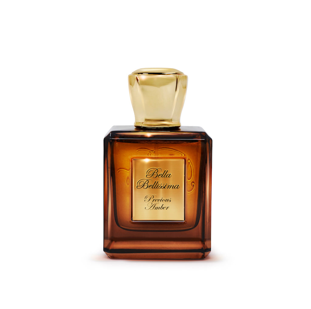 Precious Amber Oud pure parfum by Bella Bellissima, presented in a beautiful brown glass bottle with gold cap and engraved plaque.