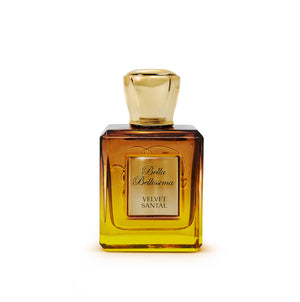 Velvet Santal eau de parfum intense by Bella Bellissima, presented in a shaded bespoke glass bottle, rich brown at the top into pale yellow golden tones. Gold cap and engraved plaque.